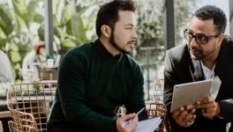 man-discussing-with-business-partner-2022-12-16-00-10-26-utc.jpg